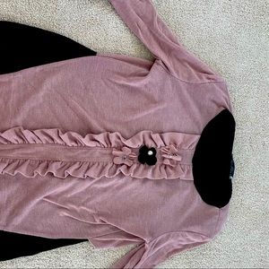 Blush pink light sweater with unique style and designs